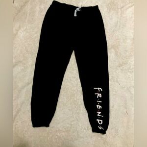 ‘FRIENDS’ black sweatpants with white string